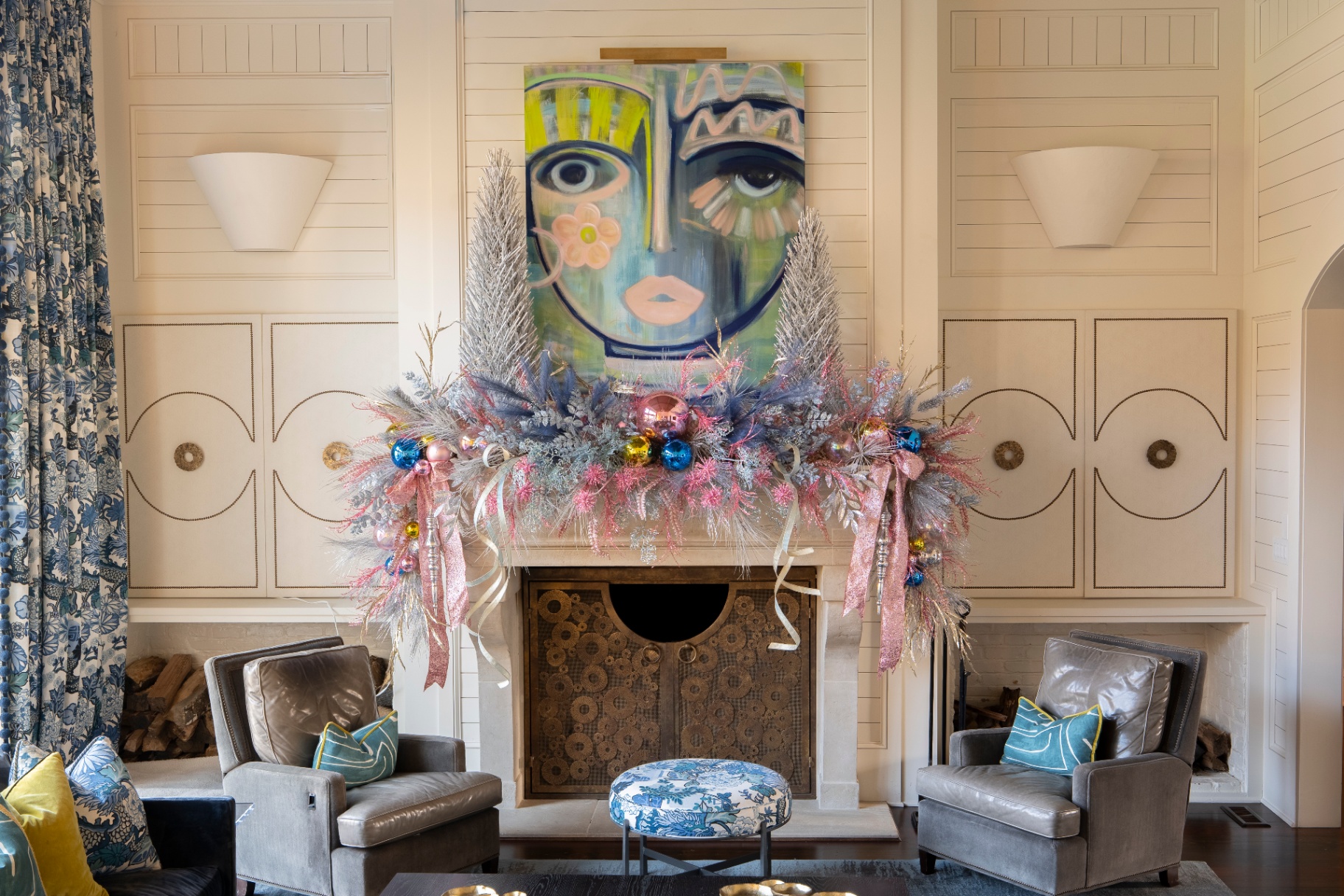 Wide view of a pastel Christmas mantle styling in a living room