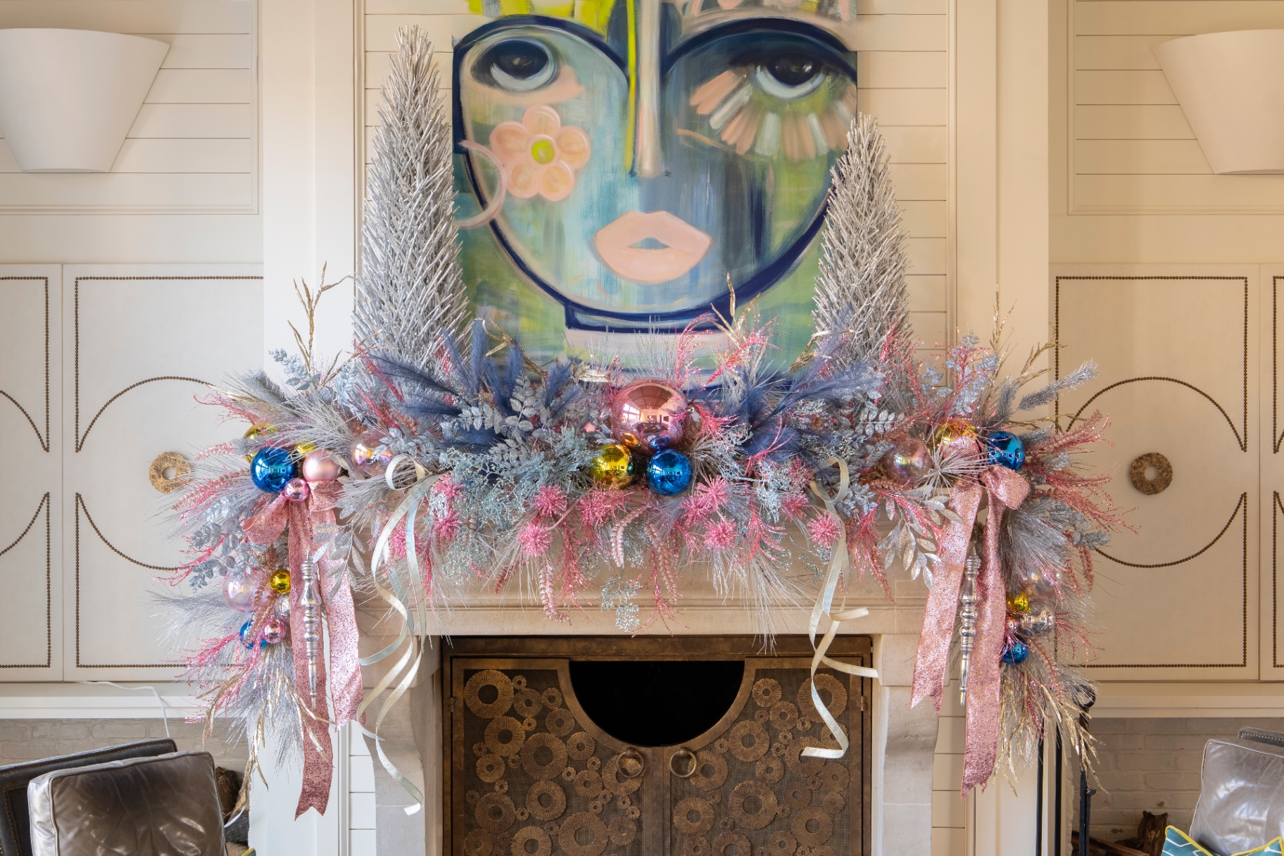 Pastel holiday mantle with silver bottlebrush trees and colorful ornaments