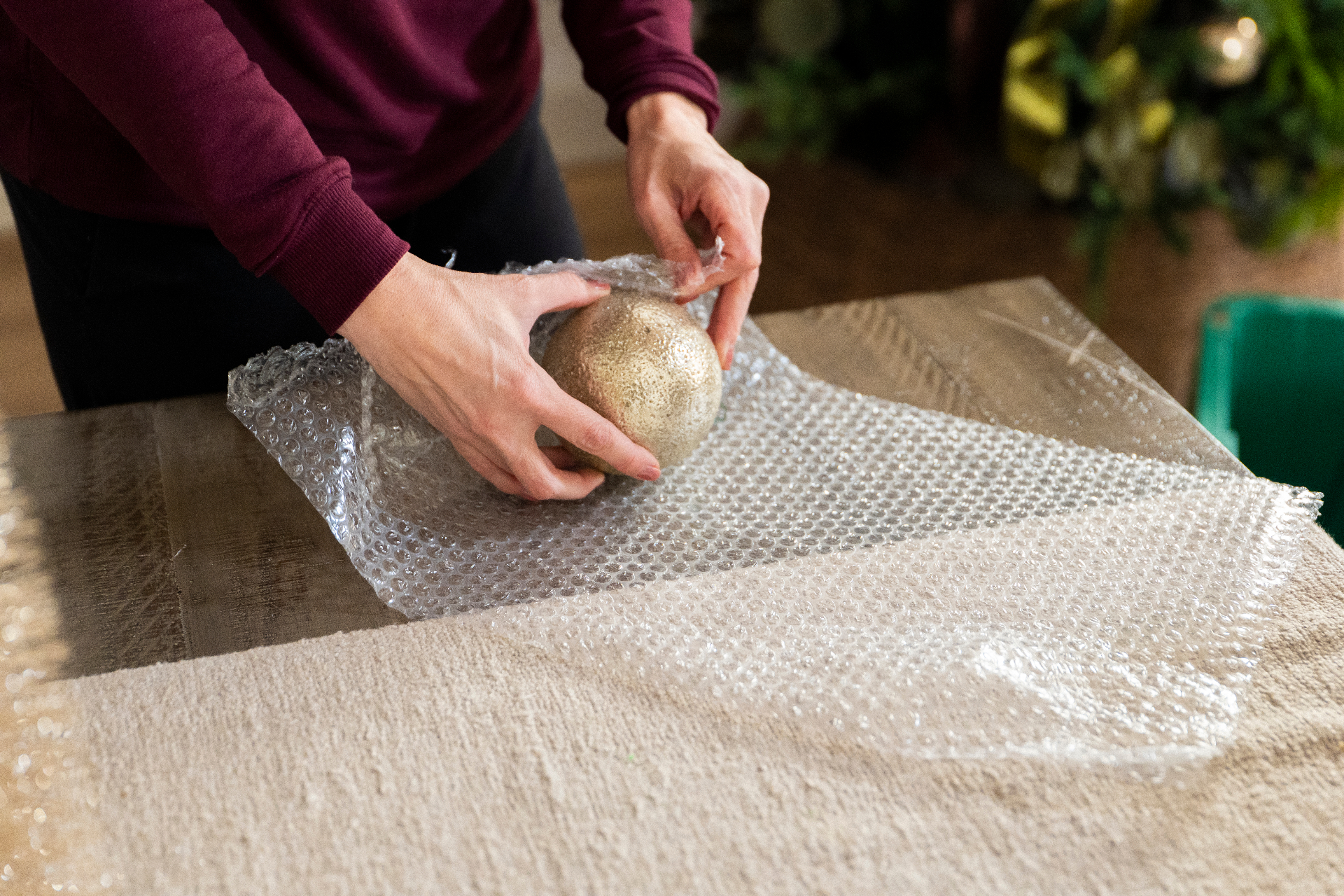 Careful wrapping and storage of holiday ornaments during takedown